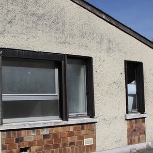 Nettoyage de façade sous haute pression par SP Couverture